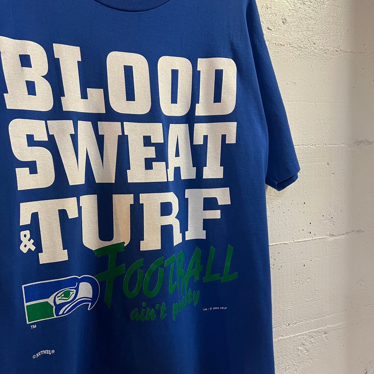 Vintage 1994 NFL Seattle Seahawks ‘Blood, Sweat & Turf’ Single Stitch T-Shirt - Size Large - Made In USA - Blue/White