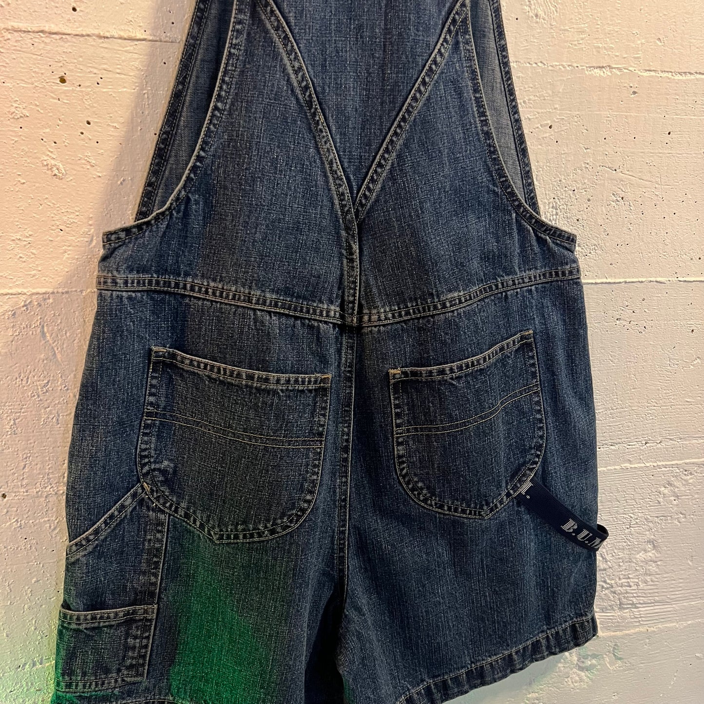 Vintage 90's B.U.M. Equipment Embroidered Spellout Denim Short Overalls - Size Small - Medium Wash Indigo
