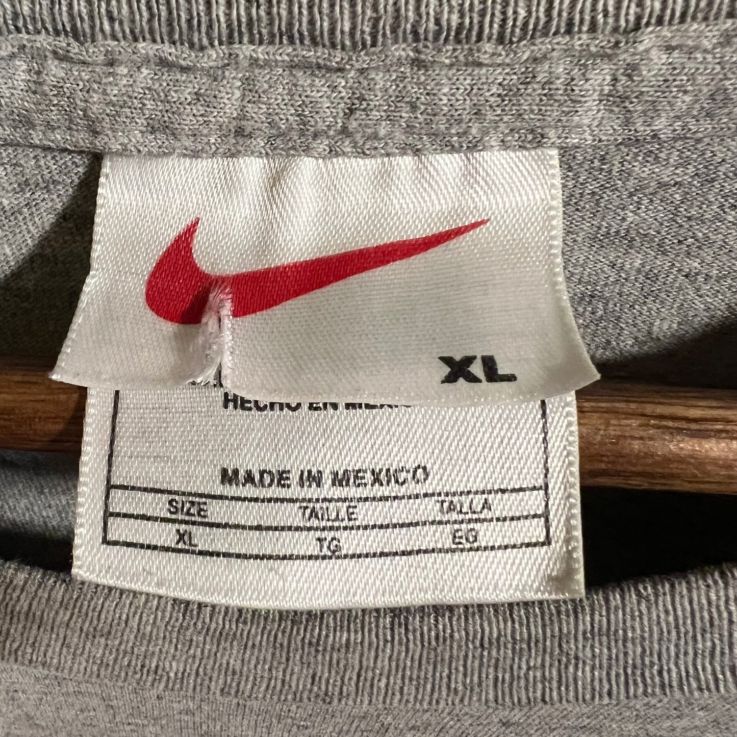 Vintage 90’s Nike Athletics T-Shirt - Size XL - Dark Heather Grey