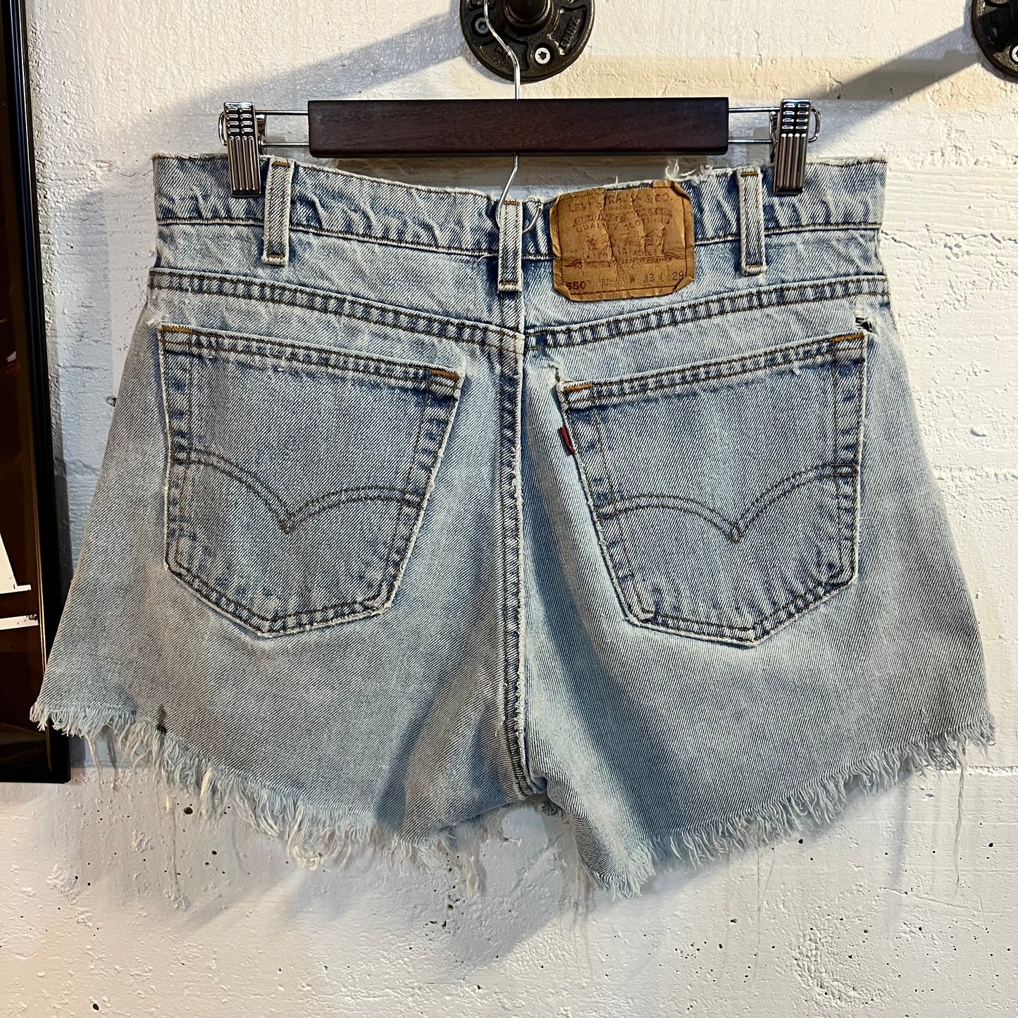 Vintage Levi's 550 Relaxed Fit Cut Off Denim Shorts - Size 33 - Made In USA - Light Wash