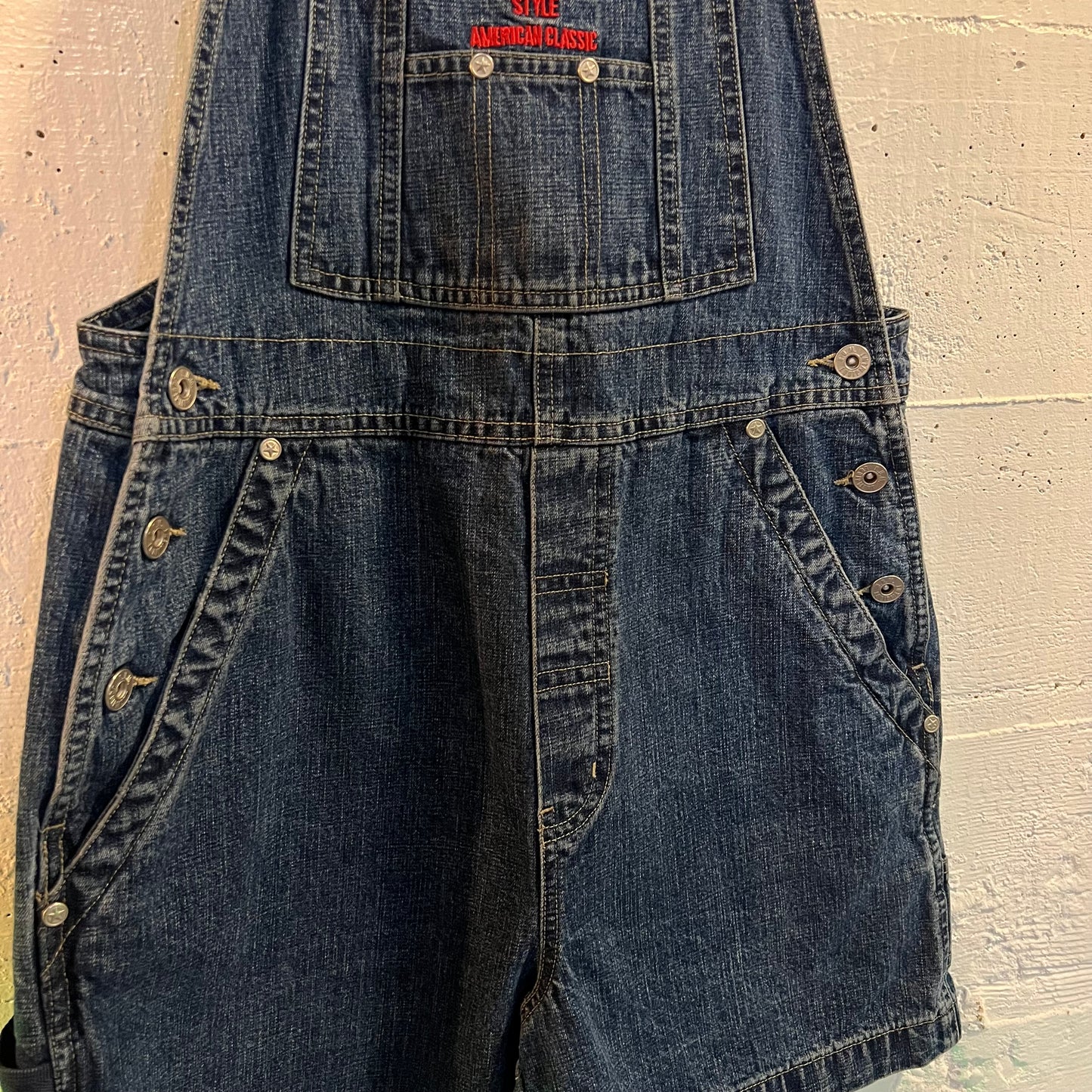 Vintage 90's B.U.M. Equipment Embroidered Spellout Denim Short Overalls - Size Small - Medium Wash Indigo