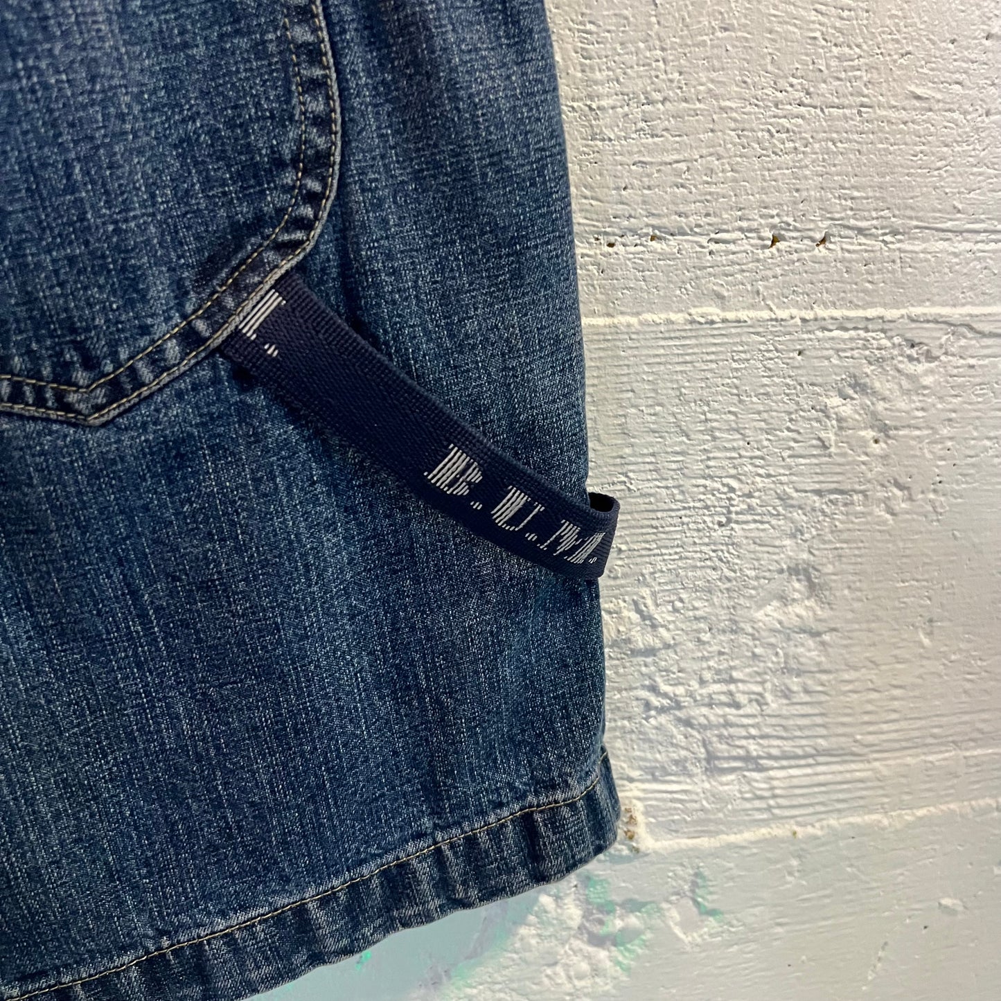 Vintage 90's B.U.M. Equipment Embroidered Spellout Denim Short Overalls - Size Small - Medium Wash Indigo