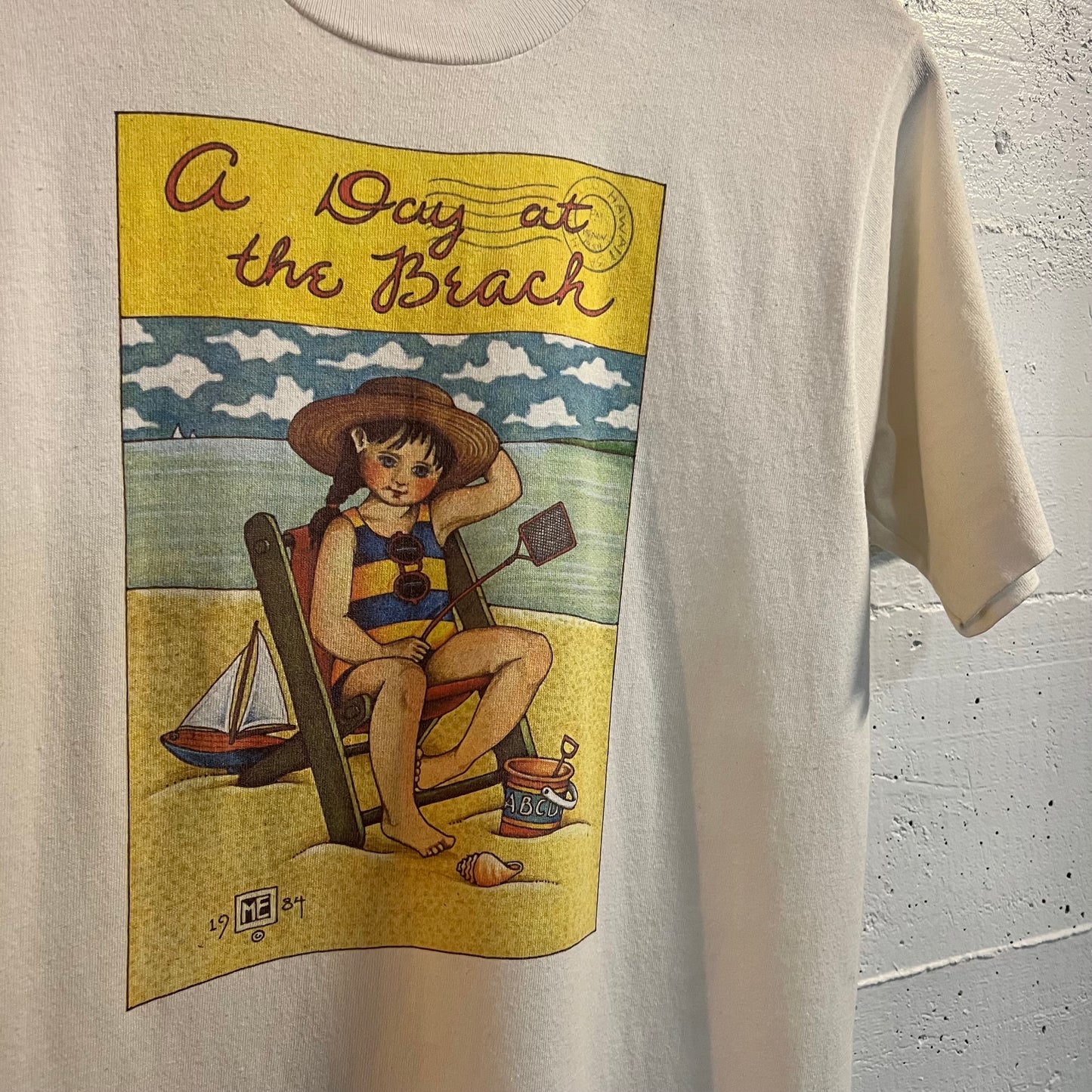 Vintage 1984 Mary Engelbreit ‘A Day At The Beach’ Single Stitch Art T-Shirt - Size Small - Made In USA - White/Multicolor