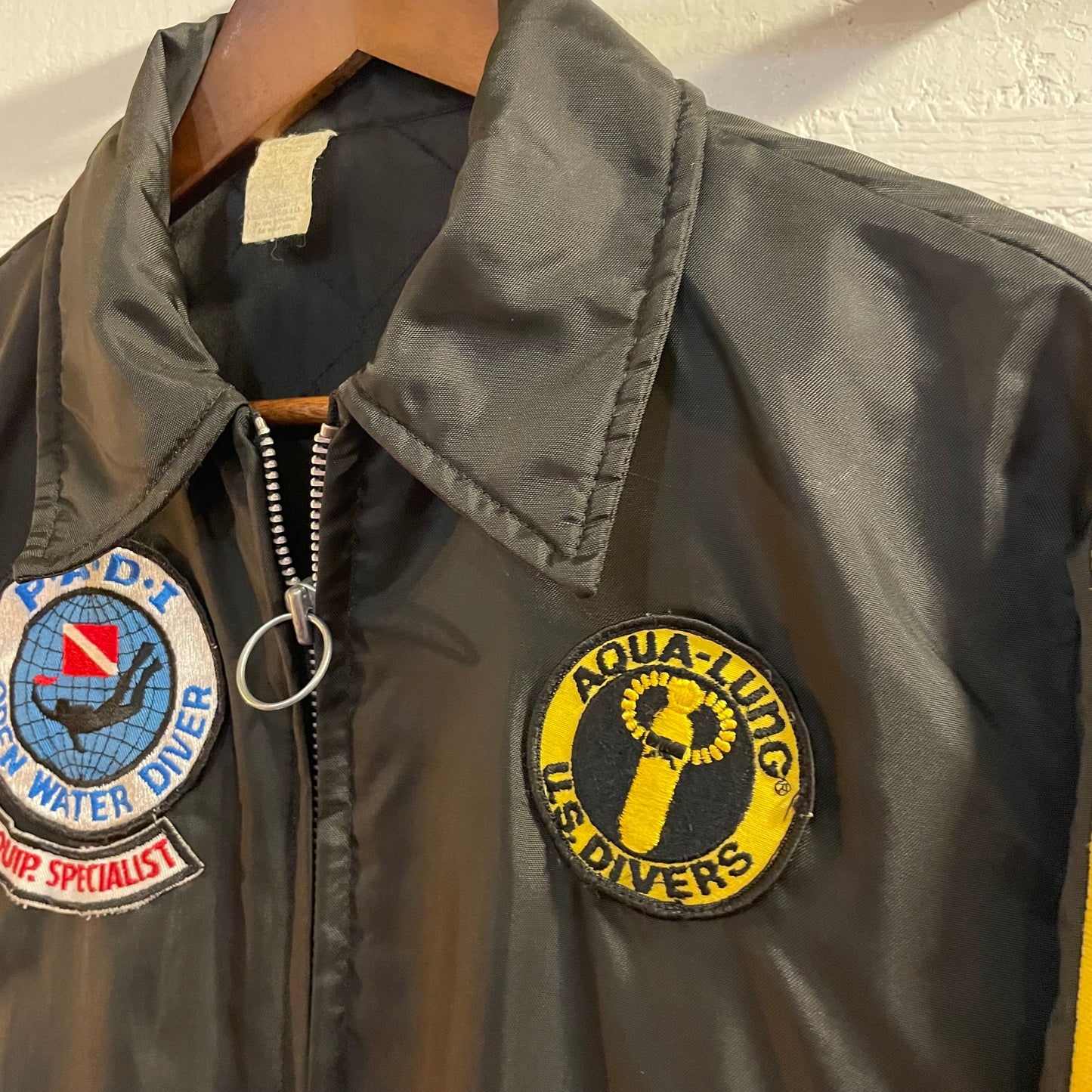 True Vintage 1970's U.S. Divers Aqua Lung Scuba Bomber Jacket With Intarsia Sleeves - Size Small - Made In USA - Black/Yellow