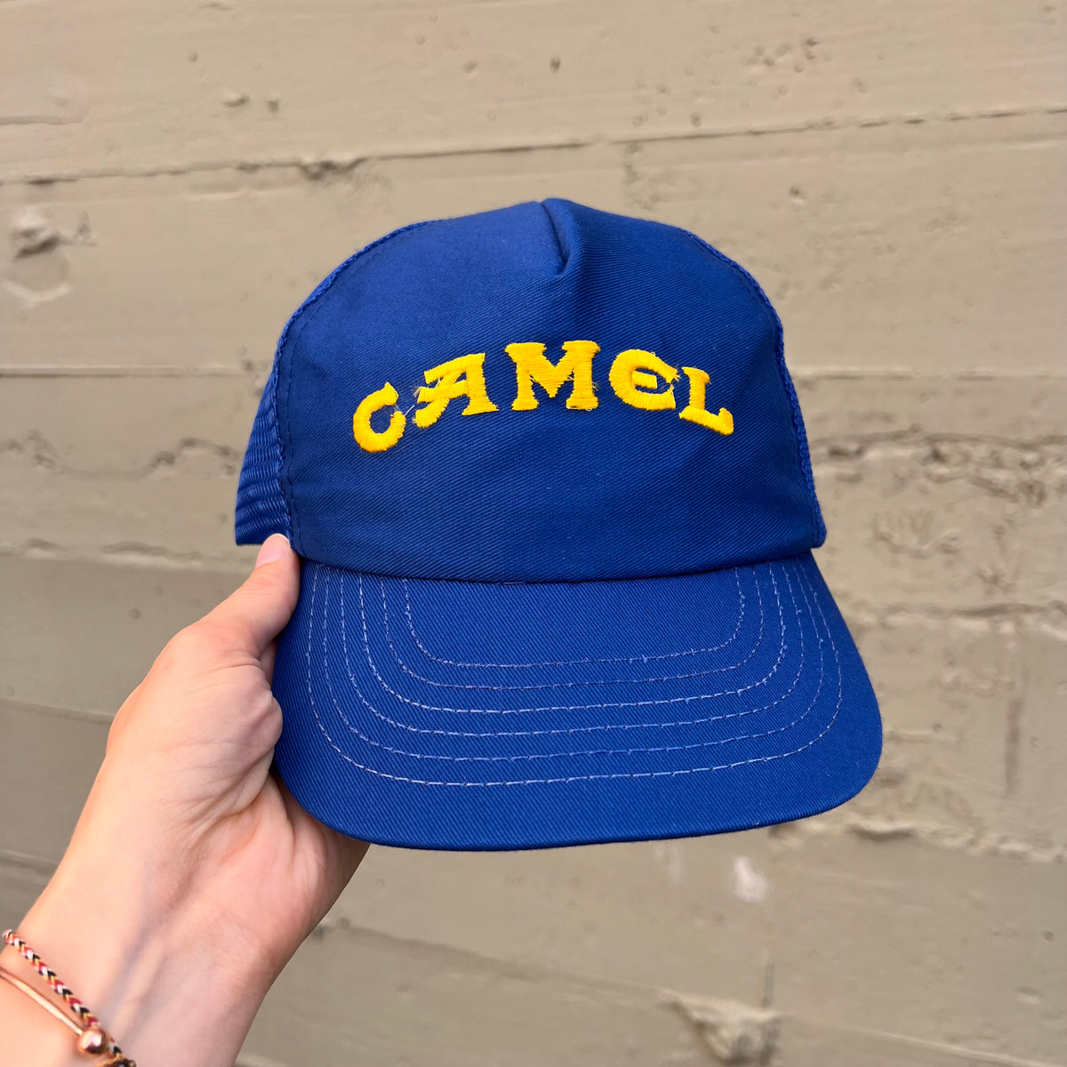 Vintage 90's Camel Embroidered Logo Mesh Back Trucker Hat - O/S - Made In USA - Blue/Yellow