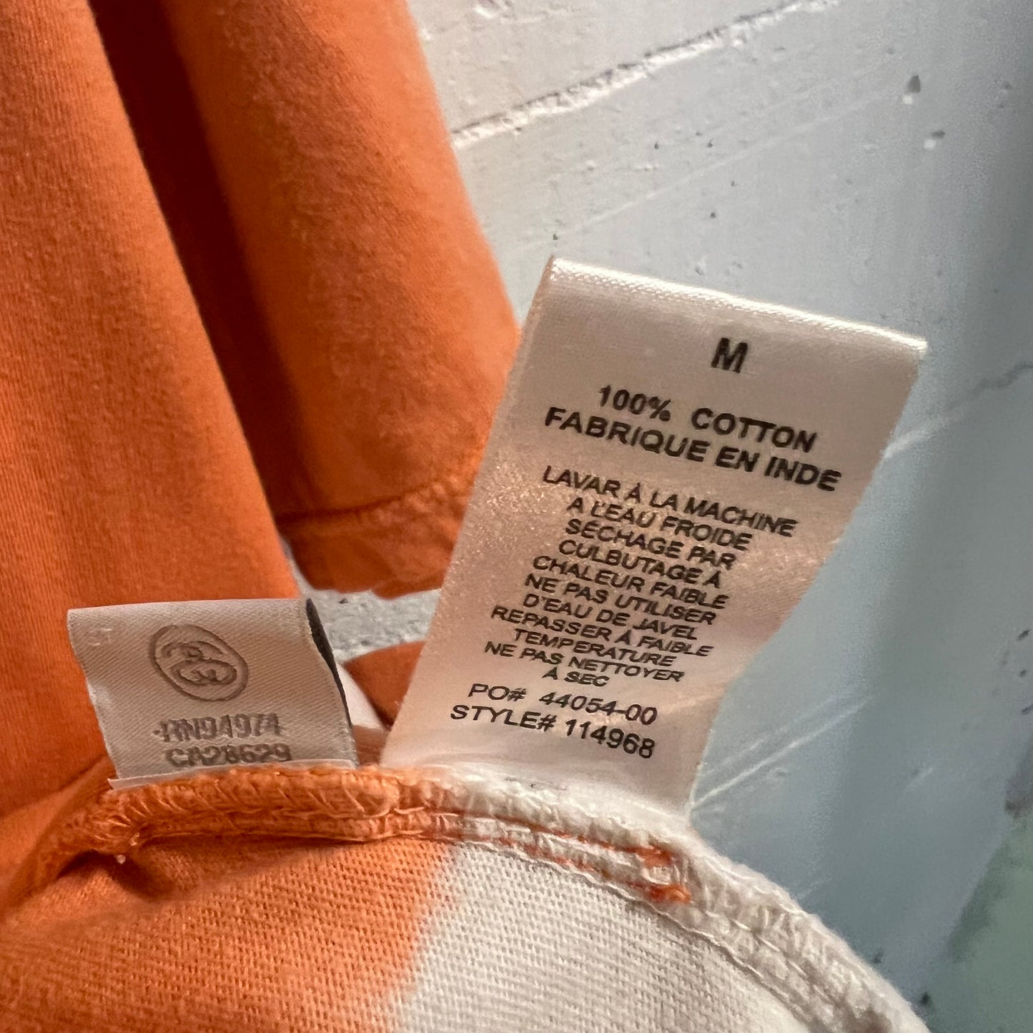 *Pre-Owned* Stüssy Bleach Dyed Embroidered Logo T-Shirt - Size Medium - Coral/White