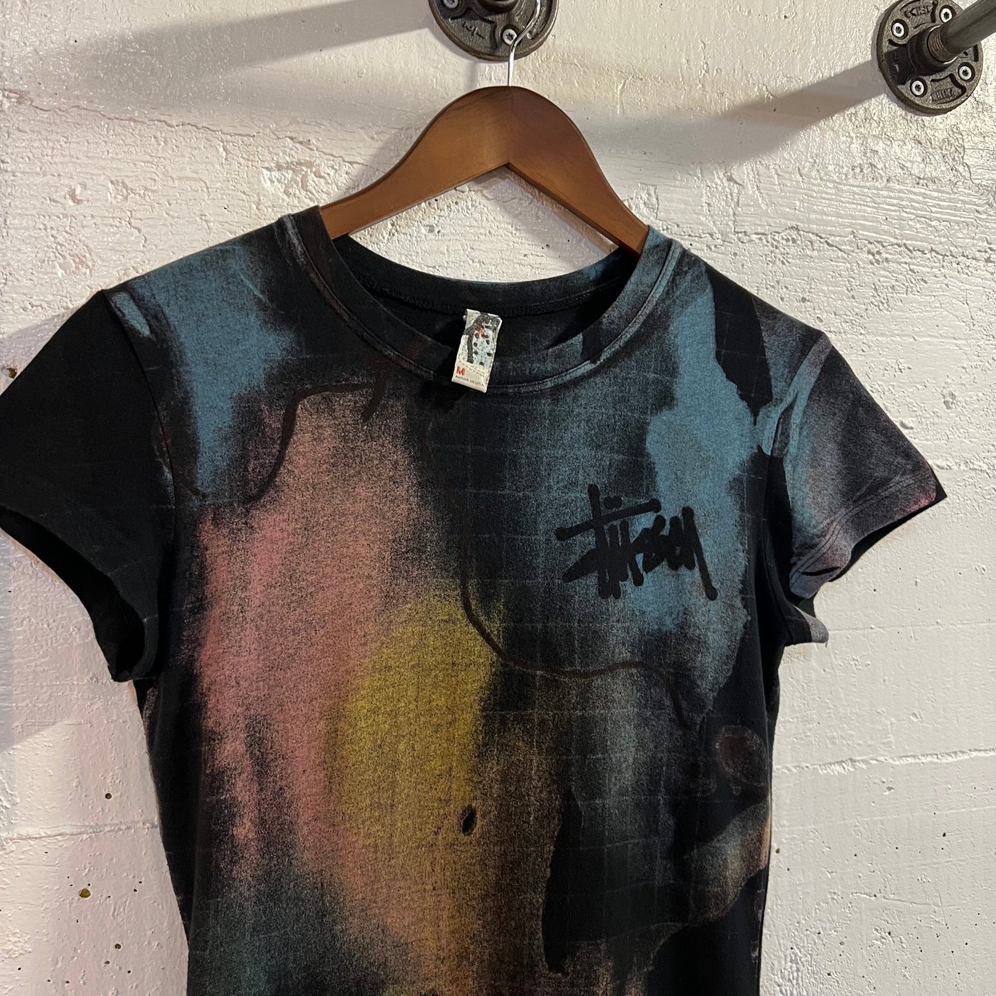 Vintage Y2K Stüssy Womens All Over Print Spray Paint Baby Tee - Size Medium - Made In USA - Black/Multi