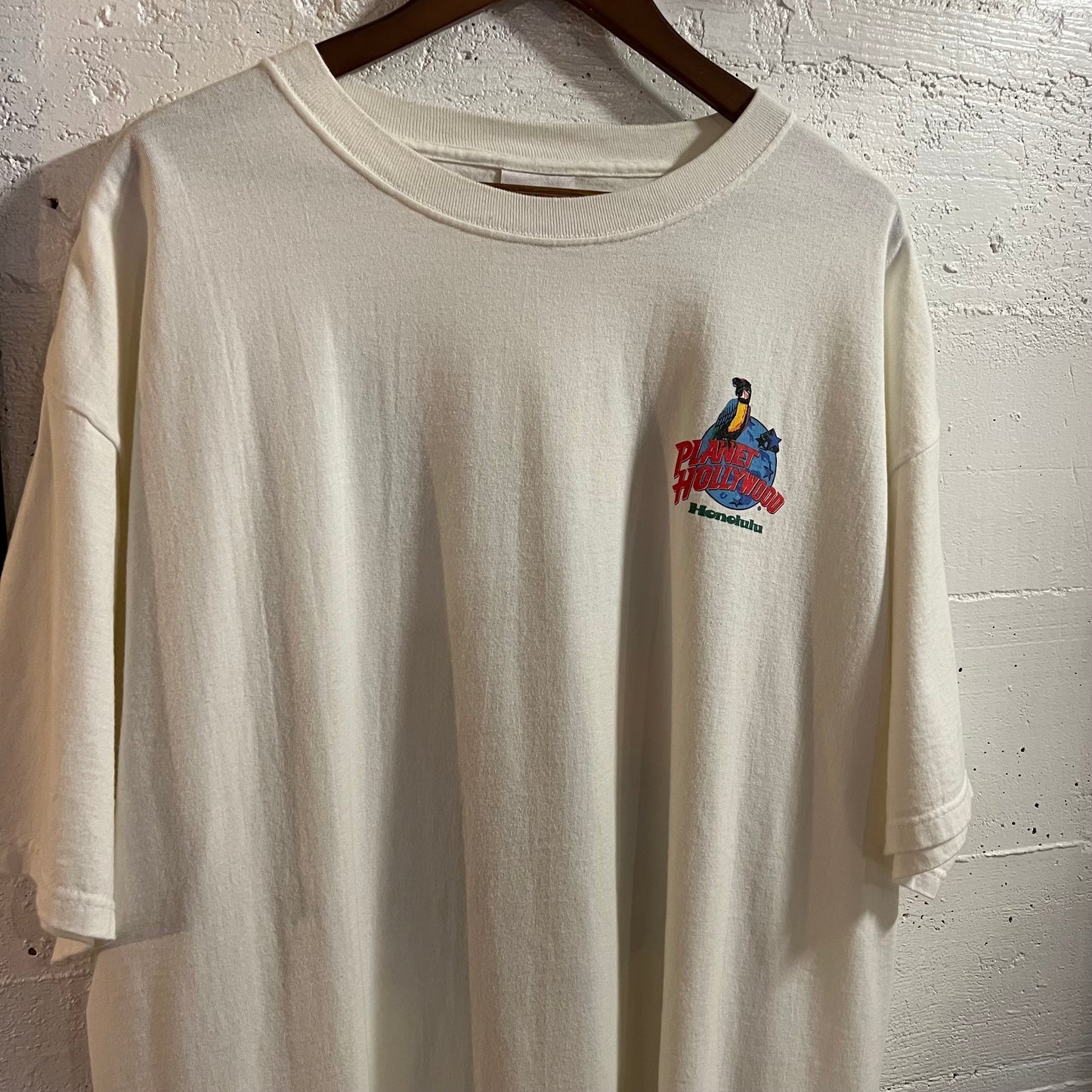 Vintage 1991 Planet Hollywood Honolulu Graphic T-Shirt - Size 2XL - Made In USA - White/Multi