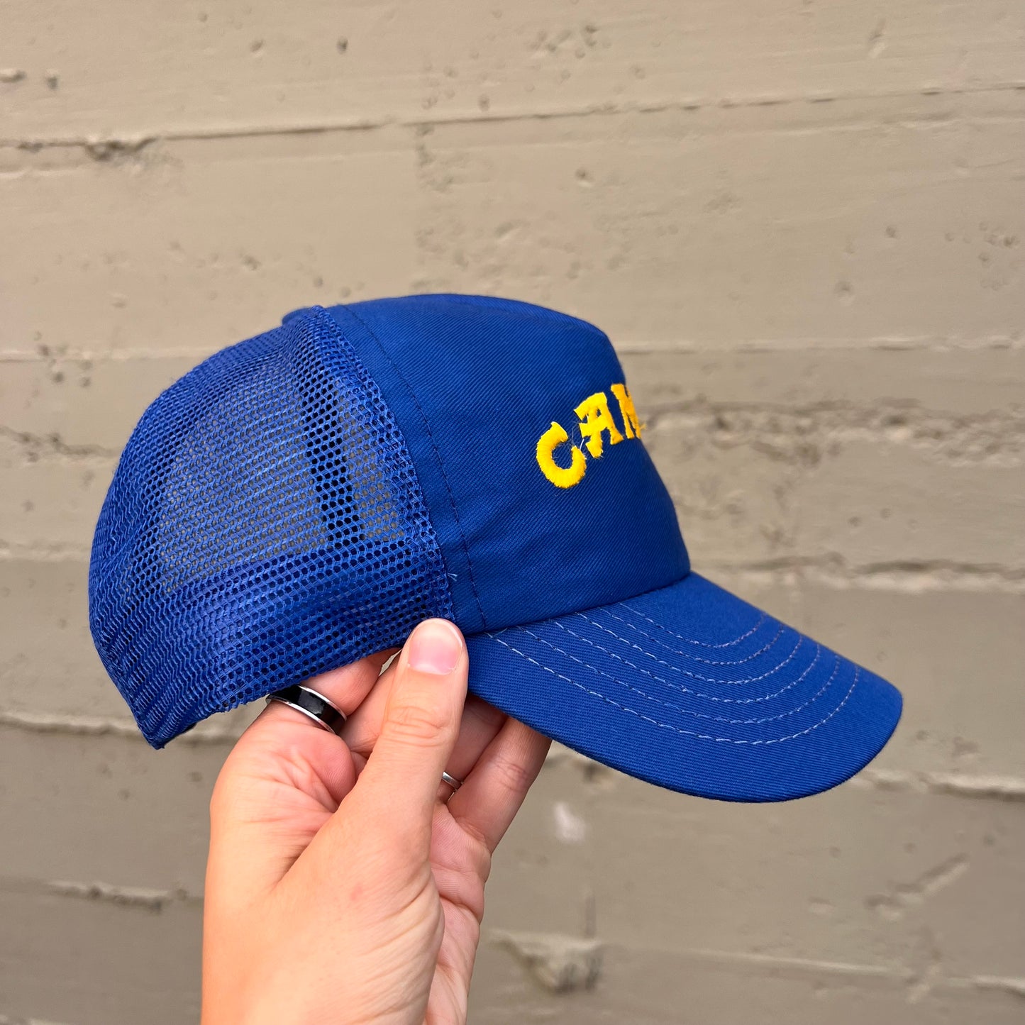 Vintage 90's Camel Embroidered Logo Mesh Back Trucker Hat - O/S - Made In USA - Blue/Yellow