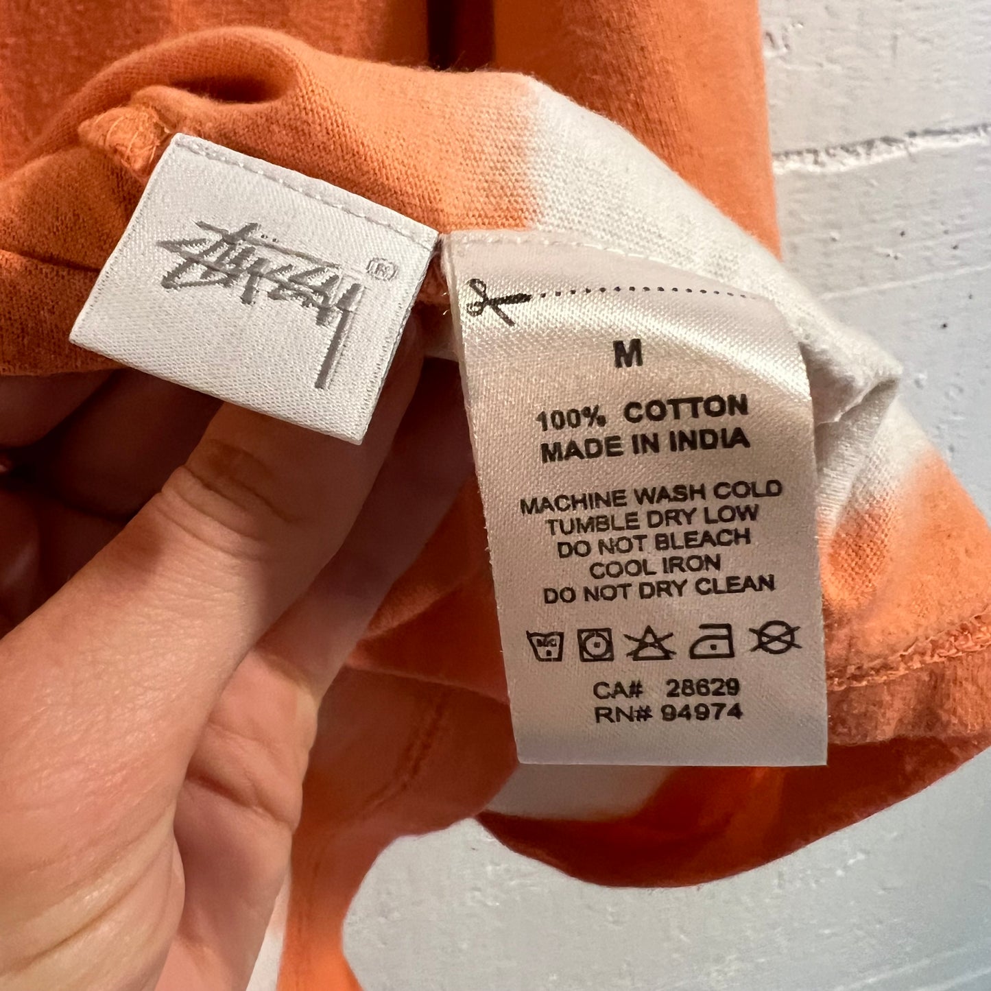 *Pre-Owned* Stüssy Bleach Dyed Embroidered Logo T-Shirt - Size Medium - Coral/White