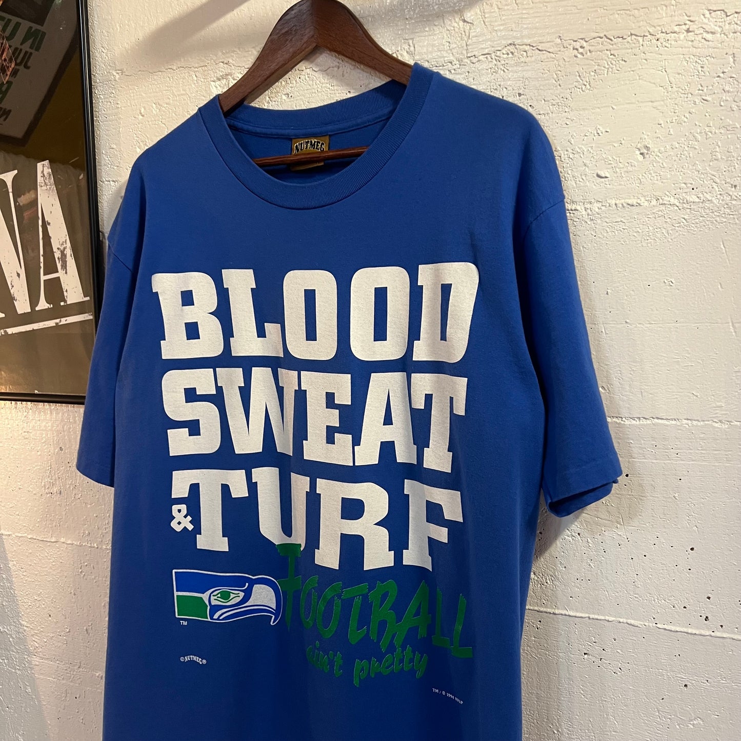 Vintage 1994 NFLP Seattle Seahawks ‘Blood, Sweat & Turf’ Single Stitch T-Shirt - Size Large - Made In USA - Blue/White