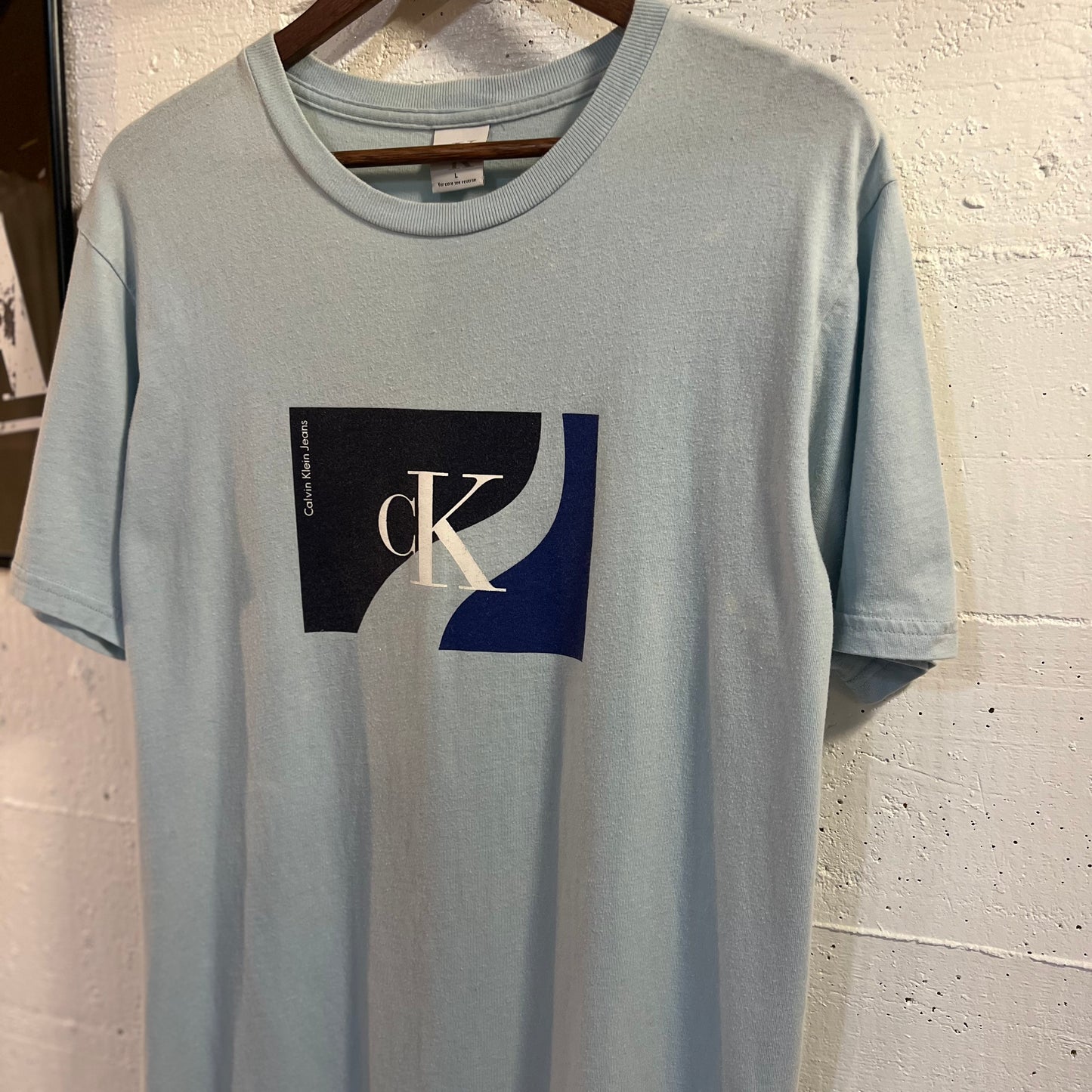 Vintage 90’s Calvin Klein Jeans Graphic T-Shirt - Size Large - Made In USA - Sky Blue