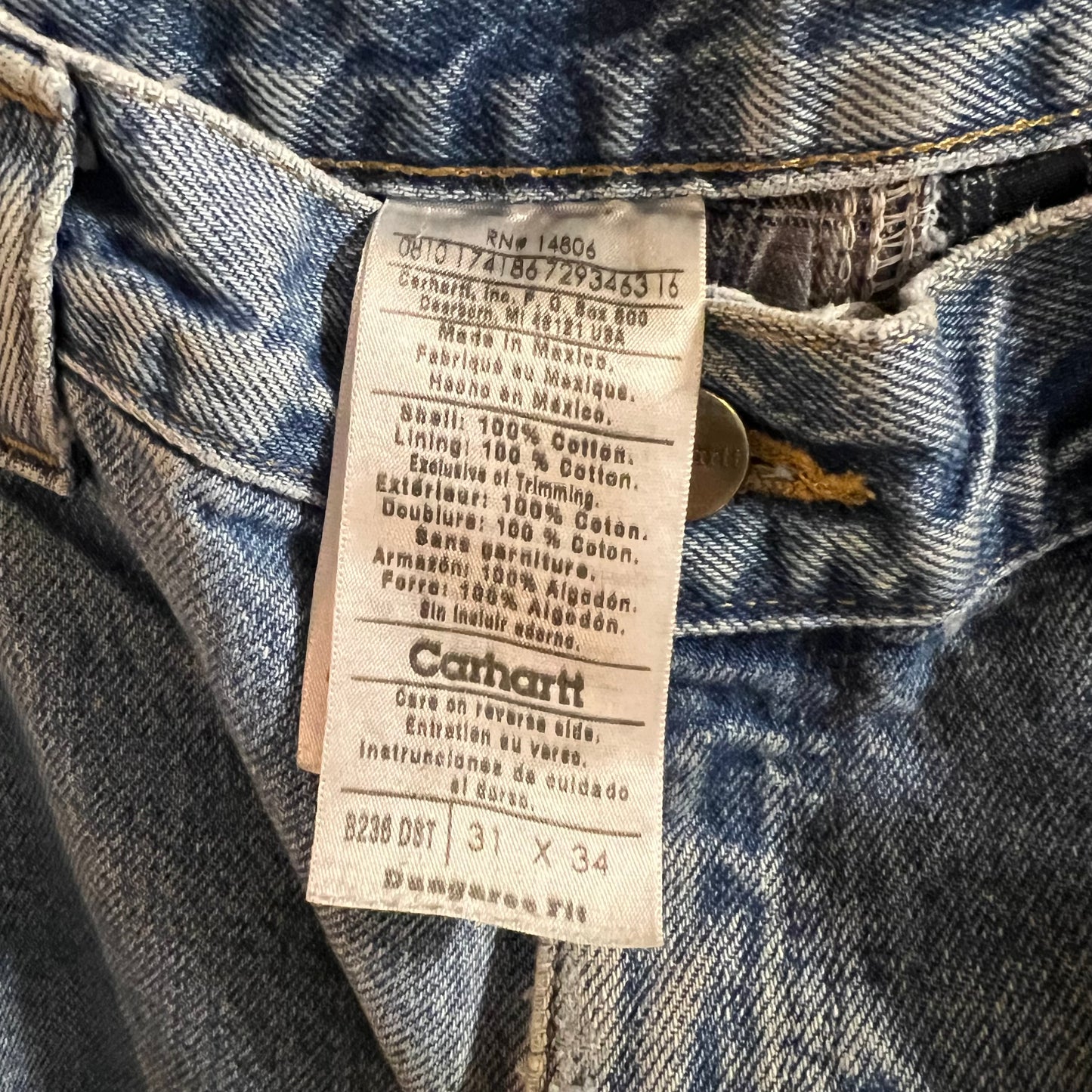 2000's Distressed Carhartt Flannel Lined Dungaree Fit Denim Carpenter Jeans - Size 31" x 34" - Light Wash Indigo - B236-DST