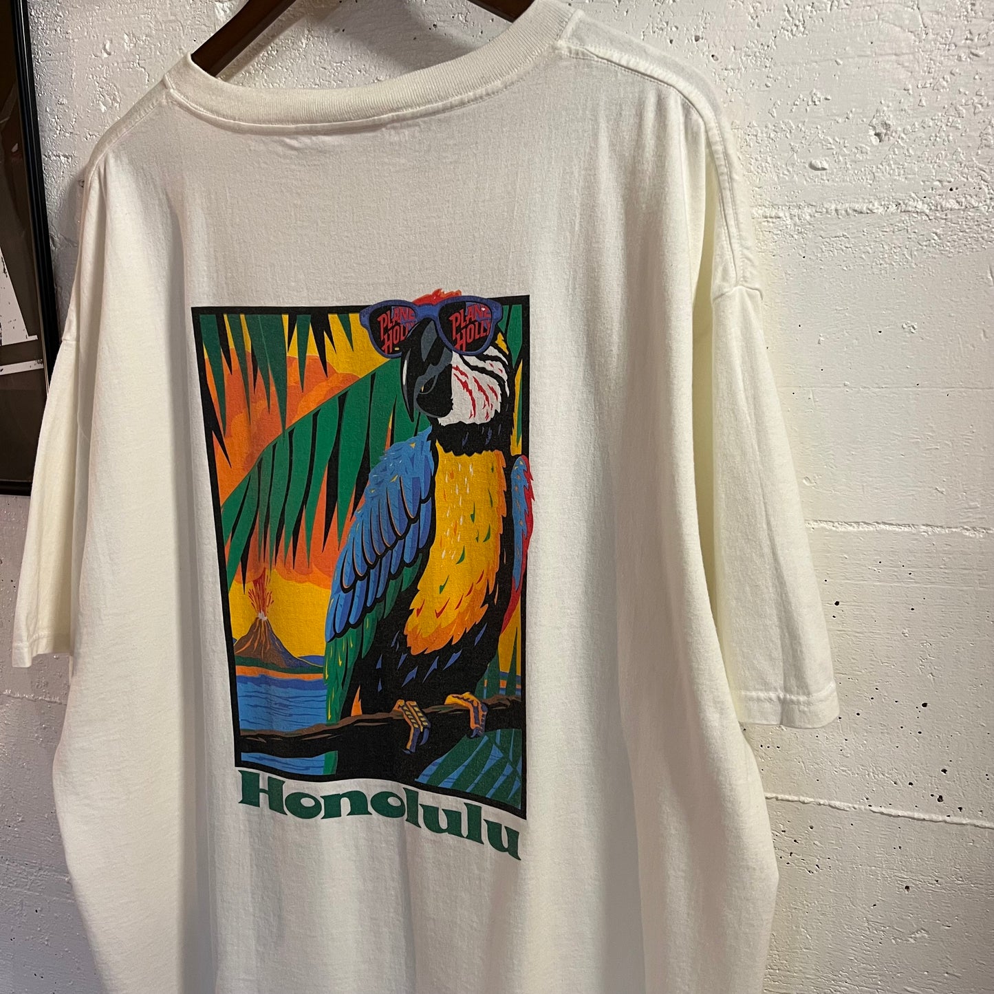 Vintage 1991 Planet Hollywood Honolulu Graphic T-Shirt - Size 2XL - Made In USA - White/Multi