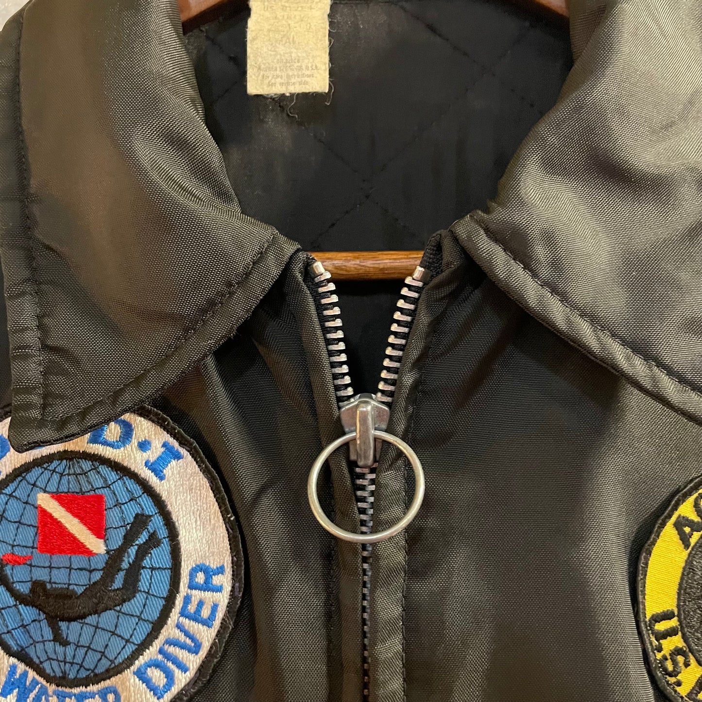 True Vintage 1970's U.S. Divers Aqua Lung Scuba Bomber Jacket With Intarsia Sleeves - Size Small - Made In USA - Black/Yellow